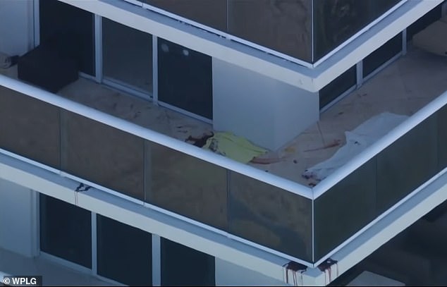 The couple's bodies could be seen lying on the 45th floor balcony of the Beach Club II Hallandale luxury condo tower overlooking Hallandale Beach, north of Miami