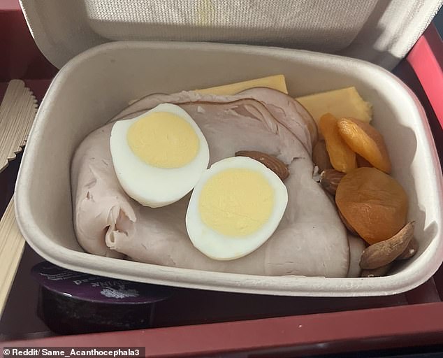 The anonymous passenger took to Reddit to share a snapshot of the 'first class meal felony' in a thread titled simply Delta.