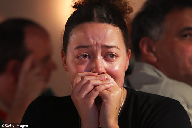 American supporters of Democratic leader Kamala Harris joked about moving to Australia (pictured, audience of the election live broadcast in Sydney)