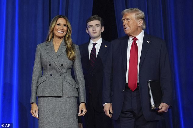 Trump, 78, will also become the oldest president ever inaugurated, surpassing President Joe Biden's record by five months. (Pictured: Donald, his wife Melania and son Barron on stage in West Palm Beach as Trump gave his victory speech Tuesday night)