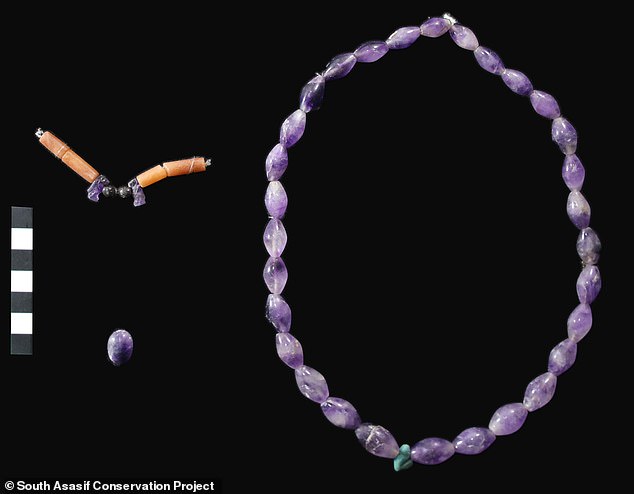 The artifacts included a bead necklace made of amethyst that was discovered while archaeologists were conducting restoration efforts on the tomb of Karabaskin, an official of the 25th Dynasty.