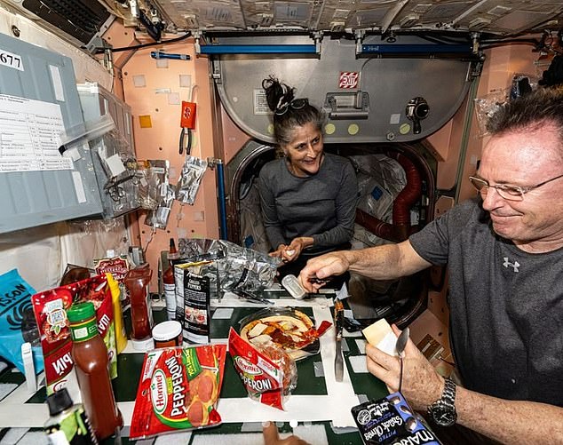 Above, the stranded NASA astronauts during a pizza meal on September 24, 2024. One doctor at the time raised concerns about Sunita's health, claiming this image showed her 