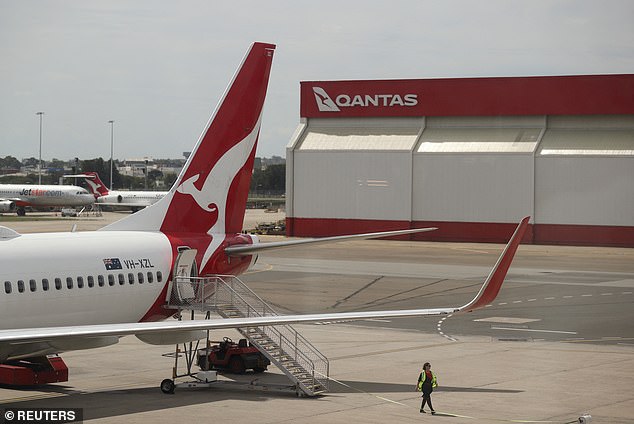 Qantas' biggest rival (pictured on plane), Virgin Australia, said it receives just 23 per cent of the $250 million the government spends annually on flights, despite being up to 30 per cent cheaper.