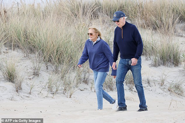 Biden nervously navigated the dangerous terrain and seemed to almost lose his balance completely, while his wife held on securely.