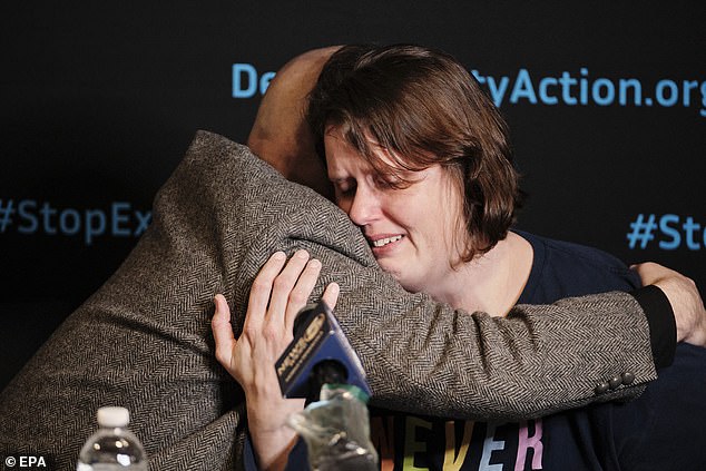 During a press conference, Pastor Dr. comforts him. Jeff Hood (L), the spiritual advisor to convicted murderer Kenneth Eugene Smith, Smith's wife Deanna Smith.