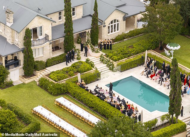 The picturesque union was a sight to behold, but fans on Facebook were more interested in the guests' strange seating at the ceremony.