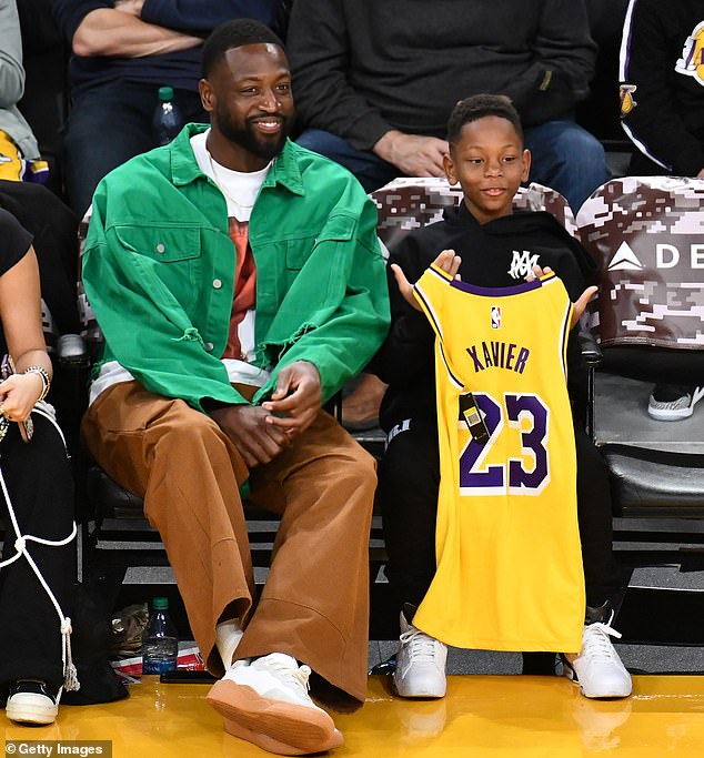 Wade and Xavier photographed at the Lakers vs Portland Trail Blazers game last November