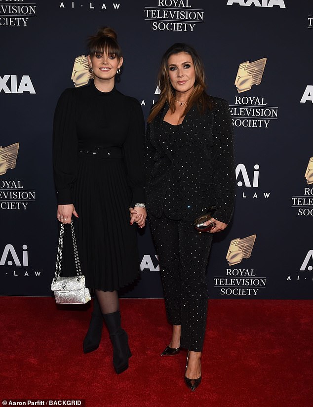 She was joined by her daughter Emilie Mae Cunliffe, 27, who looked effortlessly chic in a black midi dress with puffed sleeves.