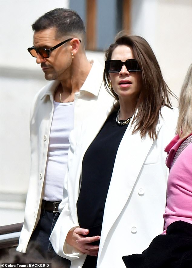 Hayley first sparked speculation after she was spotted cradling her baby bump during a trip to Venice with fiancé Ned Wolfgang Kelly in April (pictured).