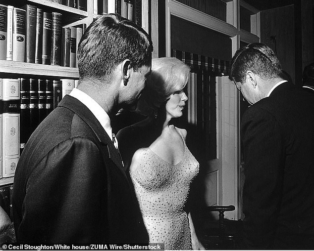 Both John (right) and Robert (left) chat with Marilyn on the night of her infamous performance.