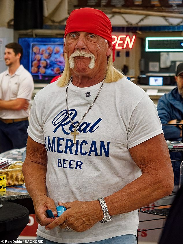 Representing her own brand, she donned a graphic T-shirt with 'Real American Beer' printed on the front and sported light-wash jeans and red sneakers. The WWE star completed her red, white and blue look with her signature bandana and reflective sunglasses.