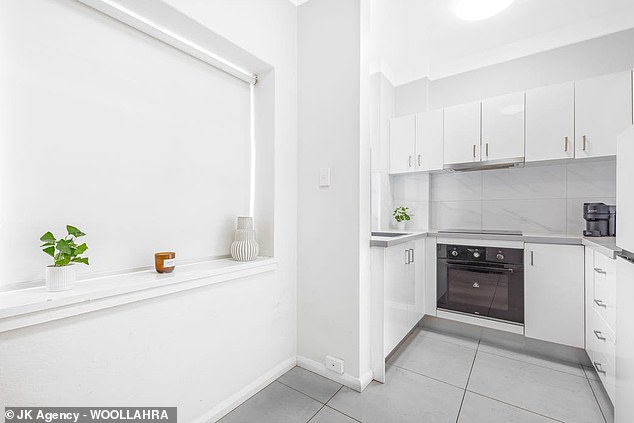 The apartment has a quiet and elevated rear position in the building along with a kitchen 