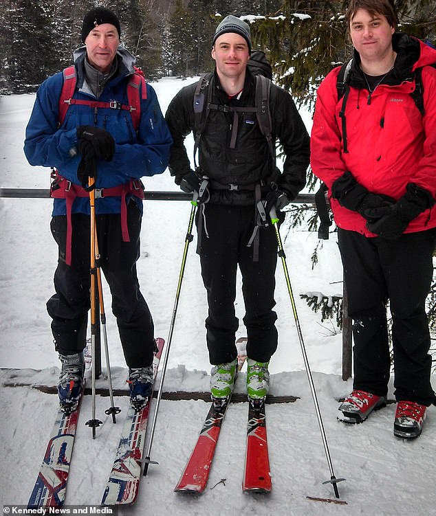 David, pictured with his sons Jared and Dallon, was shocked to learn that he had unknowingly broken his back 40 years ago, probably during one of his adventurous ski holidays.