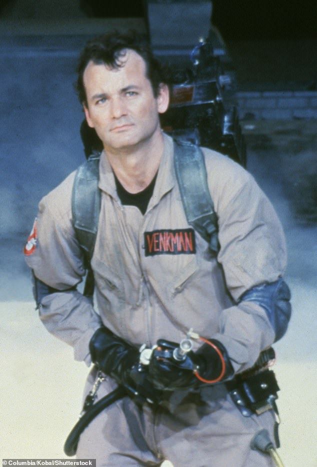 The singer, 28, channeled the famous 1984 film while sporting a beige jumpsuit with the famous Ghostbusters logo on the arm (Bill Murray pictured in Ghostbusters).