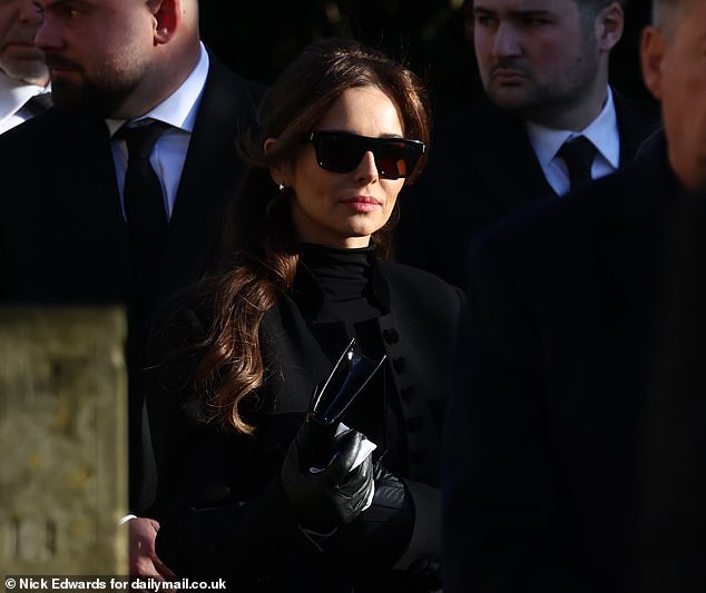 Cheryl leaves the church today after the funeral of her ex-partner Liam Payne.