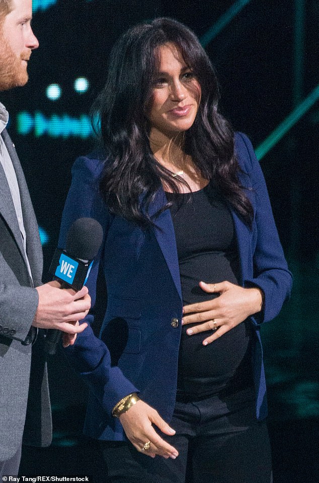 The Duchess of Sussex is seen wearing the expensive garment during an engagement in London in March 2019.