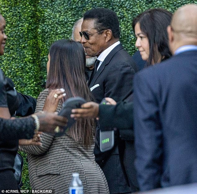 Jermaine also wore a pair of black sunglasses while appearing at the service.