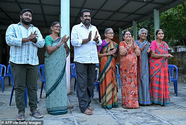 Villagers celebrating the results of the US presidential election in the Indian state of Andhra Pradesh on November 6.