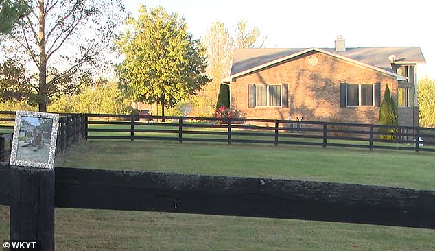 A photo of Gray Baby sitting outside the Bradenburg home in Georgetown, Kentucky