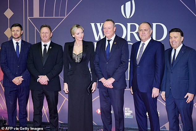 Charlene posed for a series of photos with Alan Gilpin, chief executive of World Rugby and former England rugby defender Jonathan Webb.