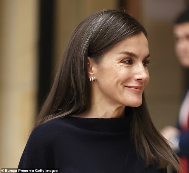 Letizia completed her comfortable look with £2,600 18k rose gold earrings from Spanish brand Gold & Roses.