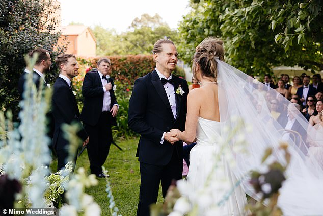 Woody couldn't wipe the smile off his face after saying 'I do'