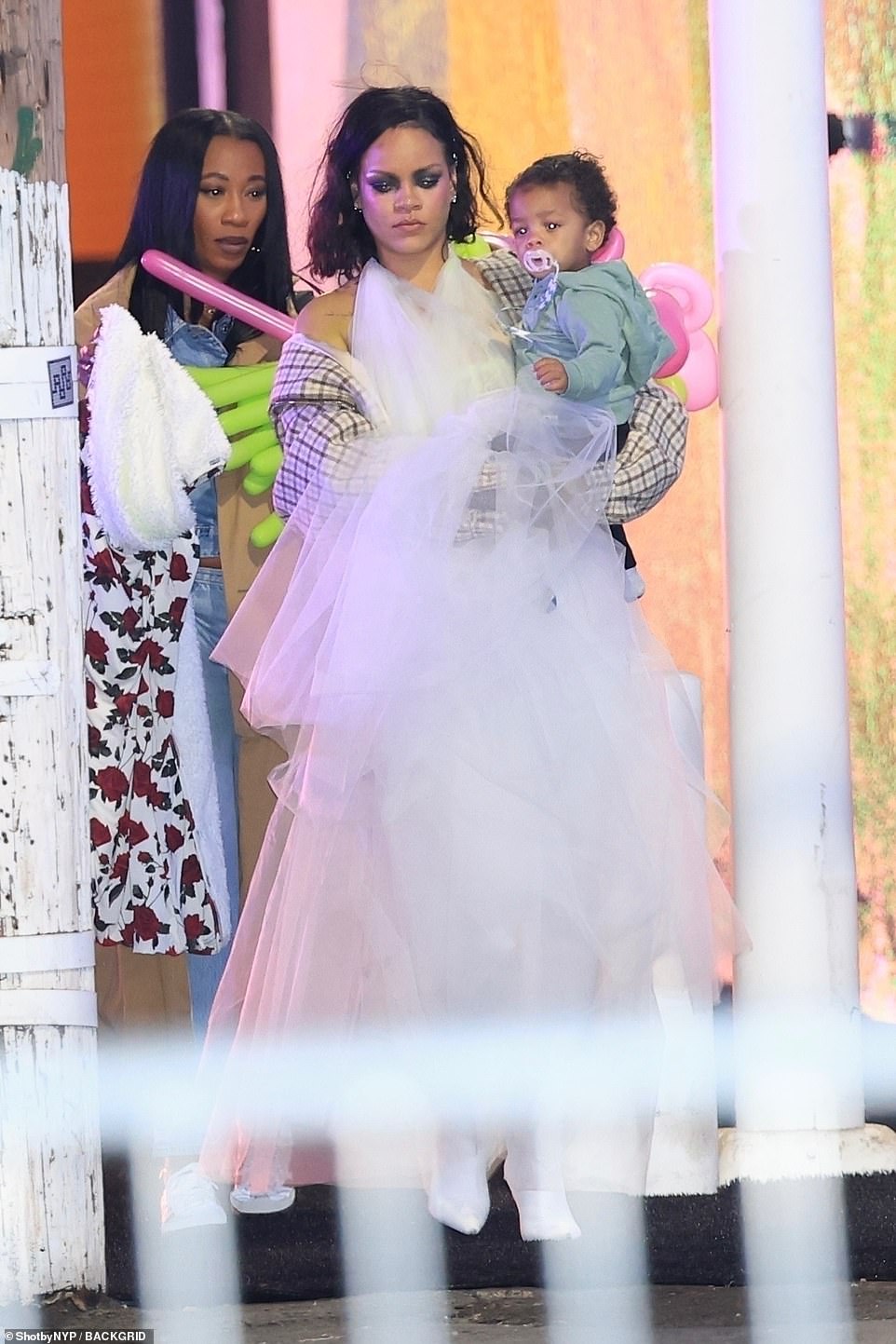 The Barbadian diva wore a Halloween princess costume with tulle over a long satin dress and added kitten heels as she left the Balloon Museum - Let's Fly Los Angeles in downtown Los Angeles.