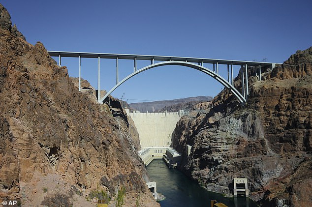 This Oct. 2, 2012, file photo shows the Hoover Dam and the Mike O'Callaghan-Pat Tillman Memorial Bridge from the helipad in Boulder City, Nevada.