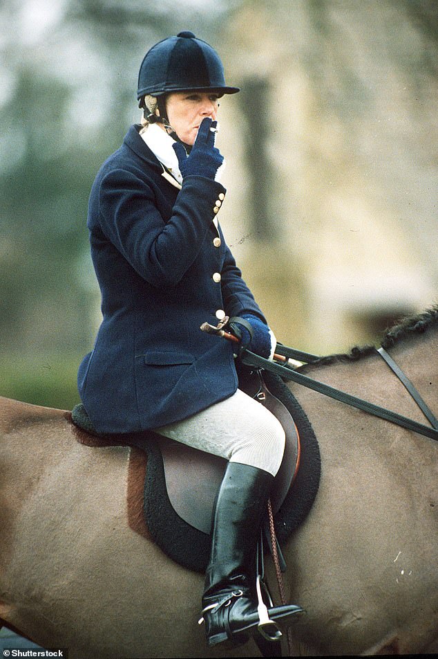 Camilla smoking while traveling with the Beaufort Hunt in 1996