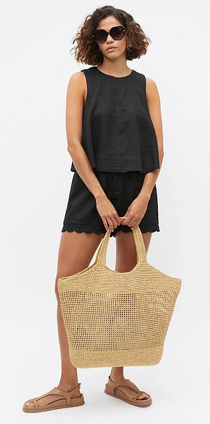 Shoppers say the scalloped hem adds a layer of elegant details to a classic basic.