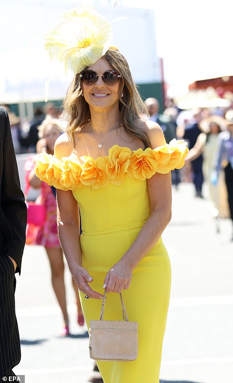 Elizabeth Hurley bucked the red theme when she stepped out in a yellow ensemble