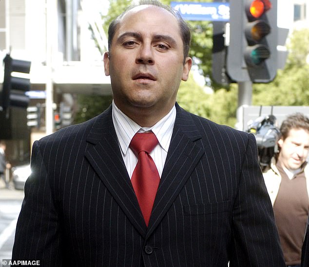 Tony Mokbel in 2000 in front of the same courthouse where he was photographed in chains on Monday.