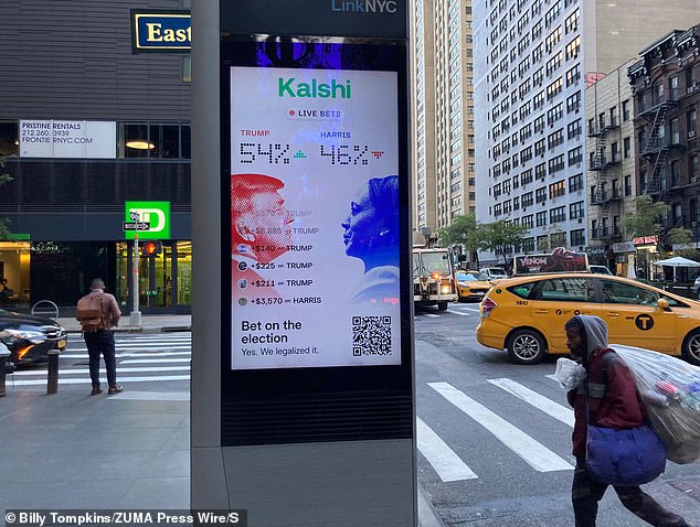 Live election betting at a digital screen kiosk on a New York City street