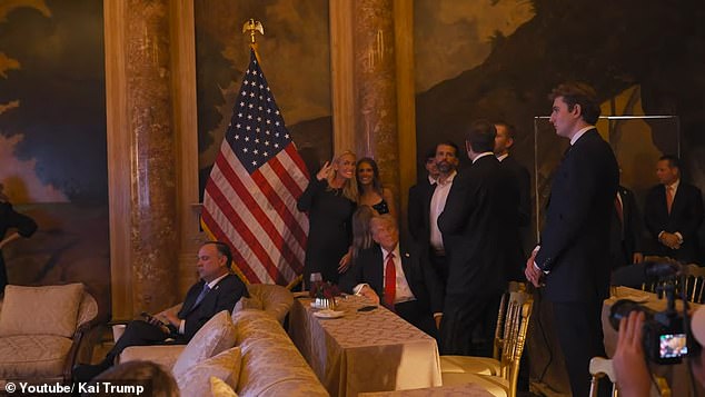 A new video clip posted to Kai Trump's YouTube shows the Trump family, including the towering Barron, watching election night coverage.