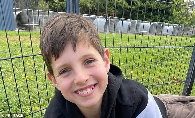 Jack Davey (pictured), 11, was sitting with his friends on an outdoor bench at Auburn South Primary School in Melbourne's east on Tuesday afternoon when a Toyota SUV crashed through the fence and hit to a group of fifth year students.