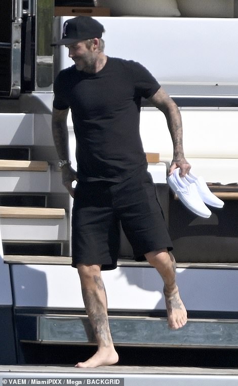 ...and David Beckham were photographed at Miami Marina on Monday as they prepared to venture out on their £16million superyacht