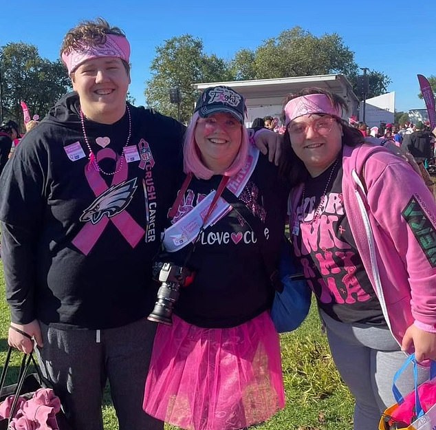 Ms Levinson is pictured with her two children who have been by her side throughout the ordeal, attending chemotherapy treatments with her and supporting her recovery.