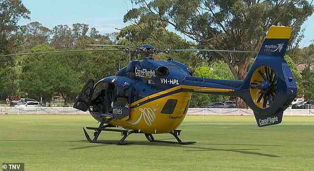 The man, believed to be in his 50s, was treated by NSW Ambulance paramedics before being airlifted by helicopter (pictured) to Westmead Hospital.