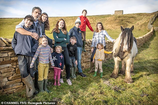 Amanda and Clive pictured with their children at Ravenseat Farm (left): Miles, Clive, Edith, Annas, Nancy, Raven, Sidney, Reuben, Violet, Clemmy and Amanda.