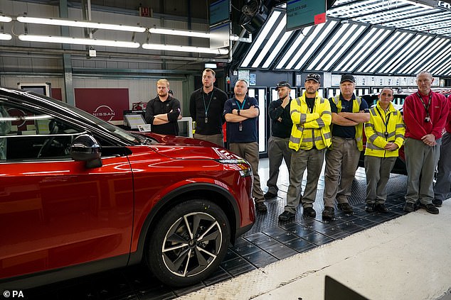 Employees listen as Nissan President and CEO Makoto Uchida spoke at Nissan's Sunderland plant last year after it confirmed two new types of electric vehicles would be made there