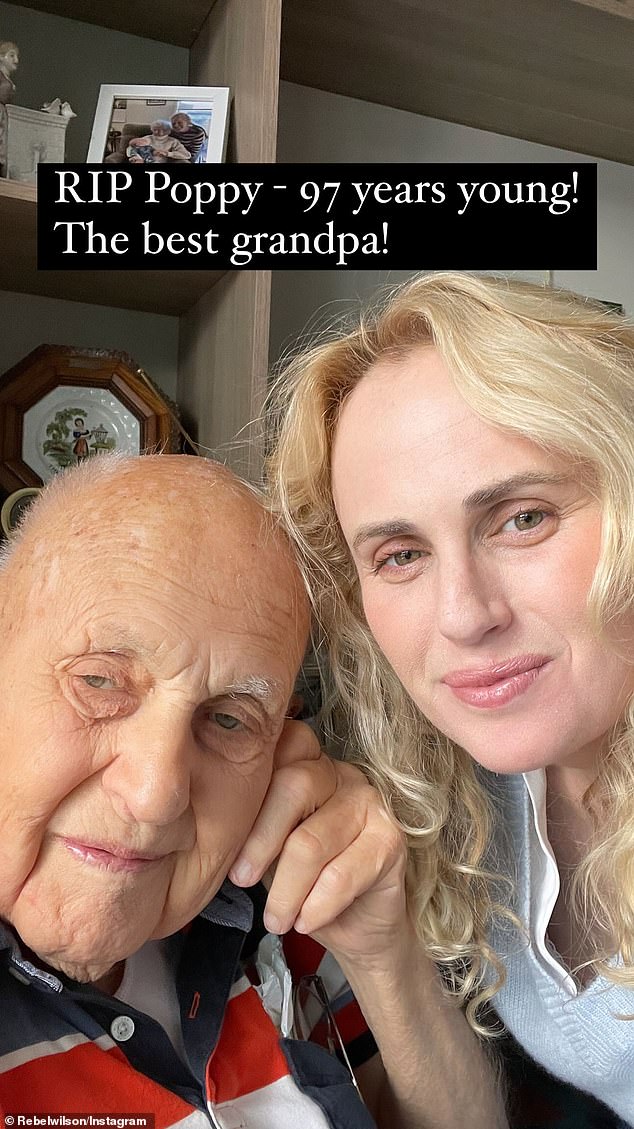 Sharing a photo of herself and her elderly relative, Rebel wrote 'RIP Poppy, 97 years old. The best grandfather!' Both in the photo