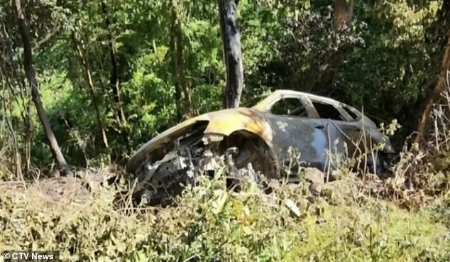 The burned vehicle. Langlois and Marchand were 'ambushed' by a hitman who killed them and then set their car on fire, according to police