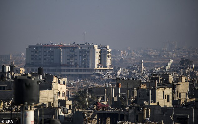 Pictured: Destroyed buildings in the central Gaza Strip after Israeli airstrikes