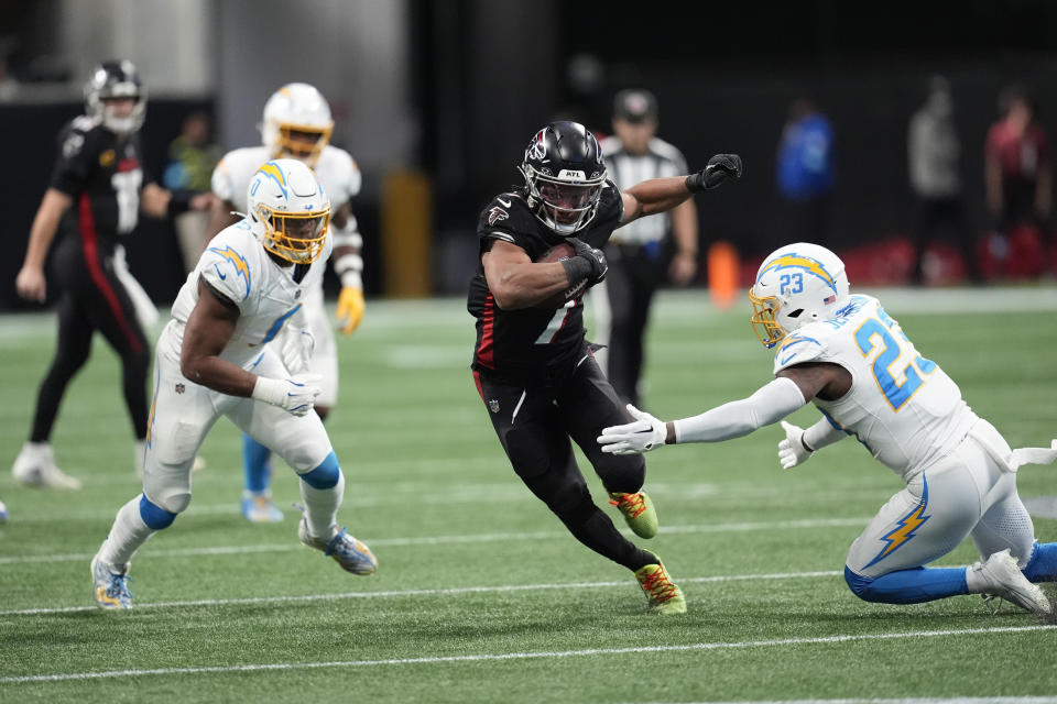 Bijan Robinson was one of Atlanta's few offensive bright spots on Sunday. (AP Photo/Mike Stewart)