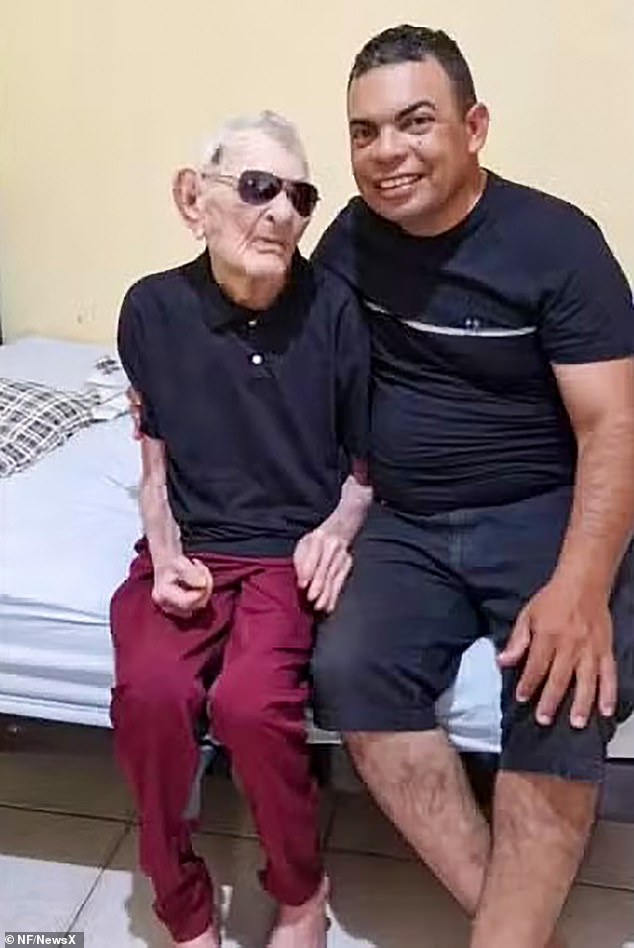 Joao in the photo with his son. He became the world's oldest man following the death of Englishman John Alfred Tinniswood earlier this week.