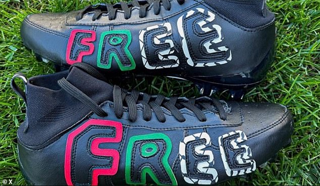 The outside of the cleats featured the word 