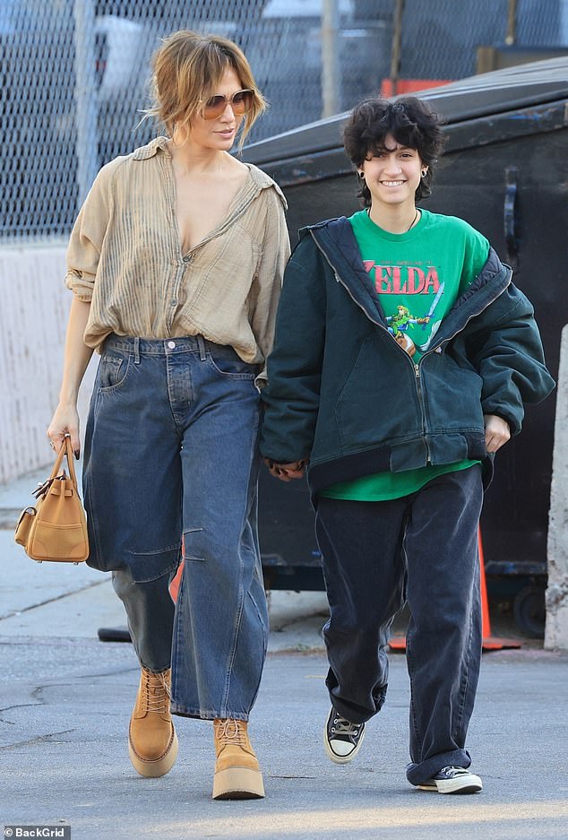 Emme, 16, joined the 55-year-old artist and uses they/them pronouns at the Melrose Trading Post flea market.