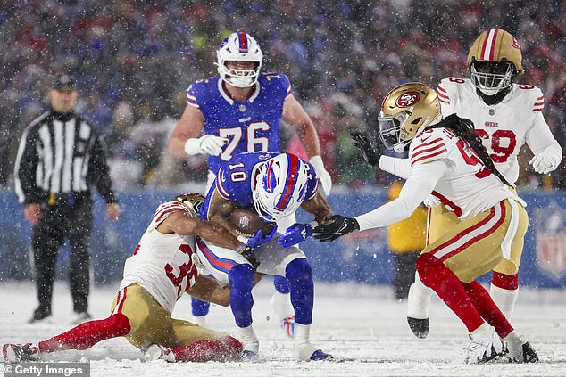 Khalil Shakir is tackled to the ground by 49ers' Matthew Wright during the first quarter