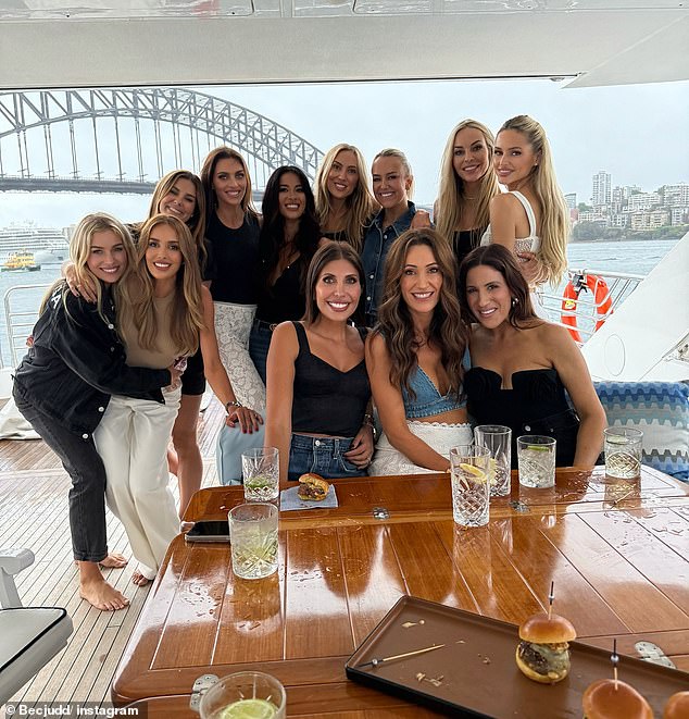 But when AFL WAG shared pictures from the social gathering on Instagram, one fan couldn't help but notice an odd detail in Bec's group photo with her friends.