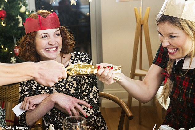 It is a tradition in Australia and the United Kingdom for guests to open Christmas cookies, or chocolates as they are often called. Cardboard tubes are wrapped in festive paper designs and contain a paper crown, a written joke or riddle, and sometimes a toy.